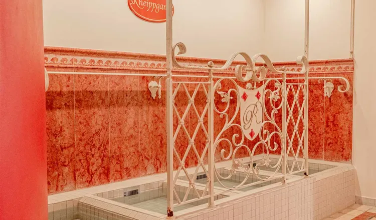 Kneipp water treading pool with playful metal area in the wellness area of the Rugard Thermal Strandhotel.